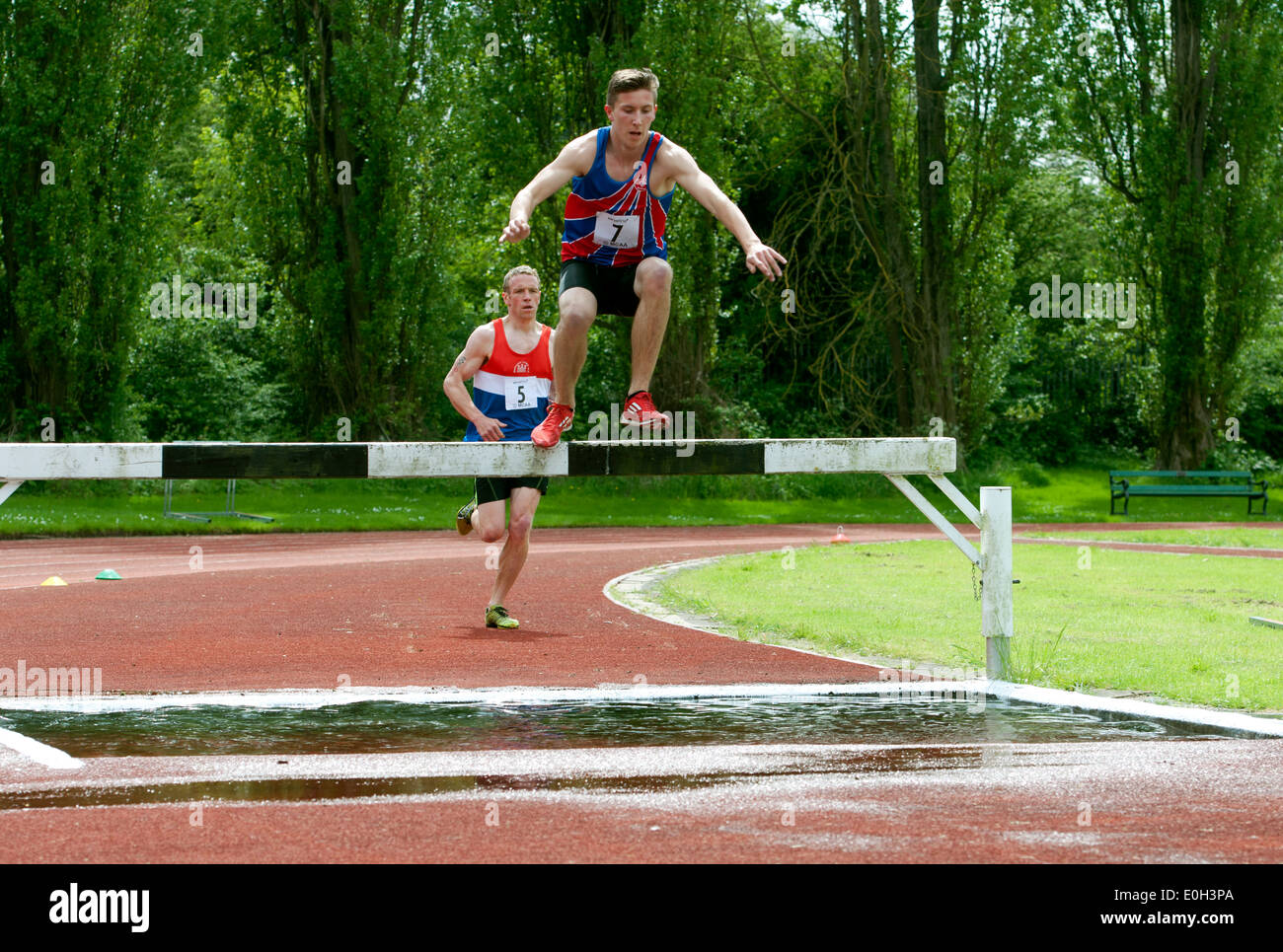 Athletics, men`s steeplechase at club level, UK Stock Photo